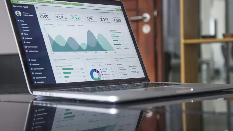 A laptop showing an overview of figures and charts